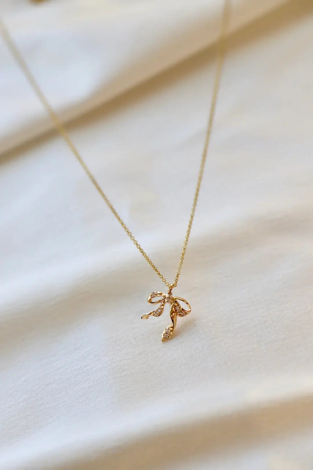 CZ Bow Necklace in Gold