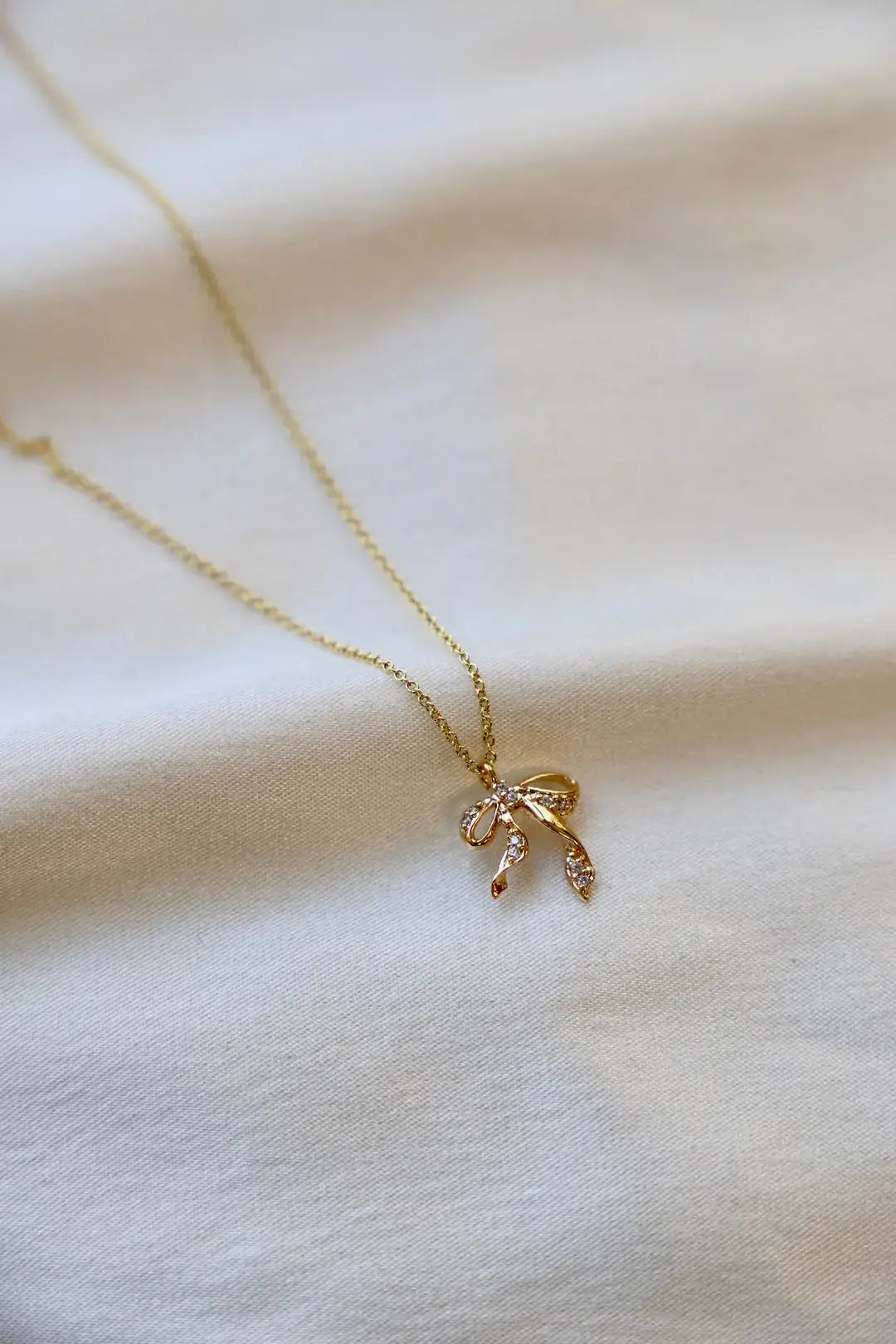 CZ Bow Necklace in Gold