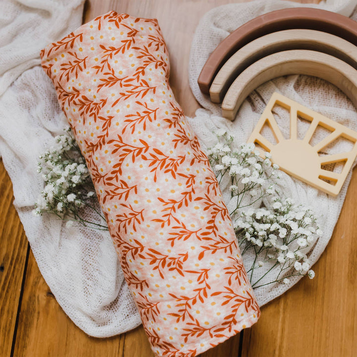 Pink Daisy Baby Swaddle | One Canoe Two Paper Co.