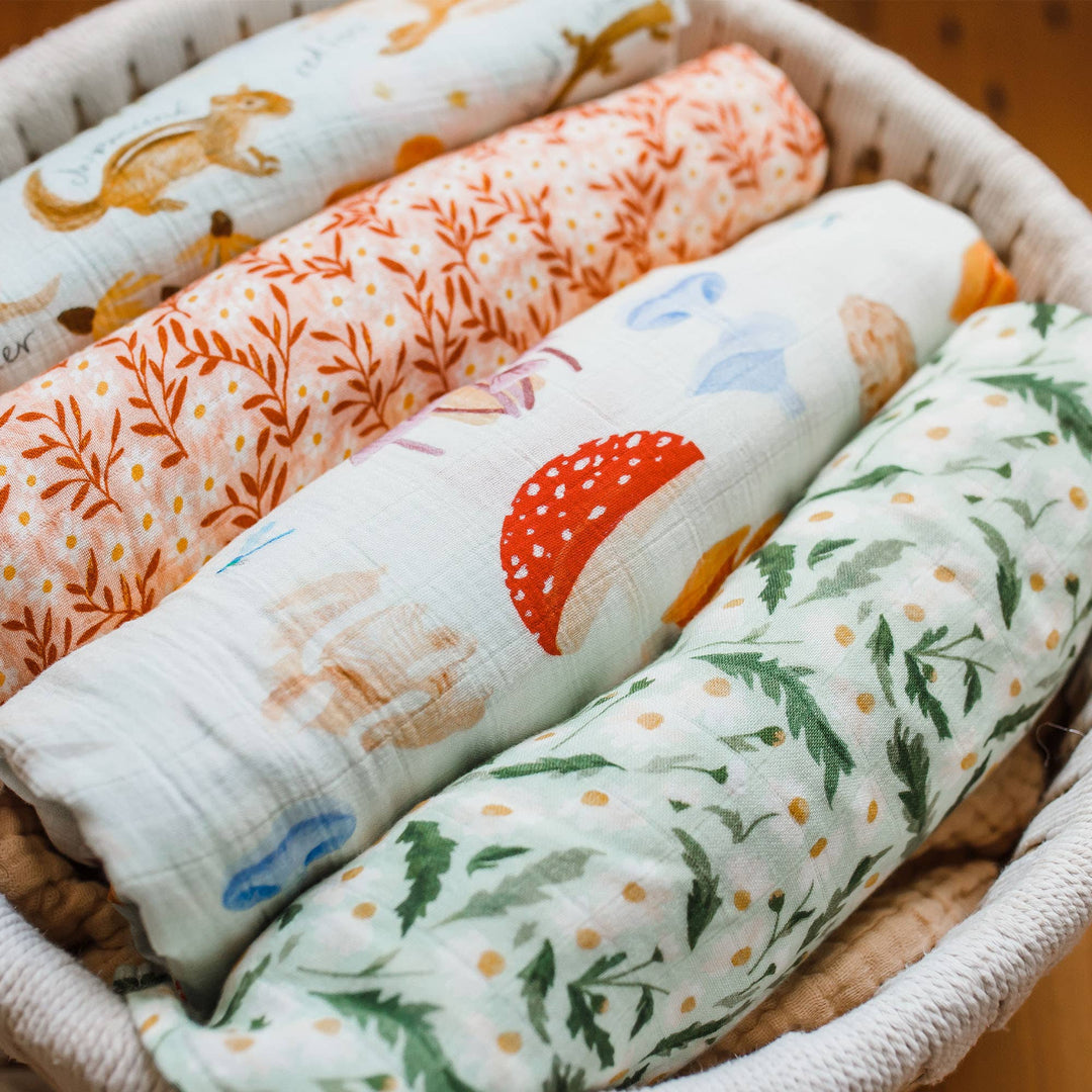 Pink Daisy Baby Swaddle | One Canoe Two Paper Co.